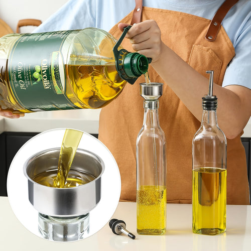 A Transparent 17 Oz/500Ml Glass Bottle for Olive Oil, Designed for Dispensing Edible Oils. It Comes with a Funnel And a Stopper, Making It Ideal for Kitchen Use. This Square Container Can Hold Various Liquids Such As Oil, Soy Sauce, Cooking Wine